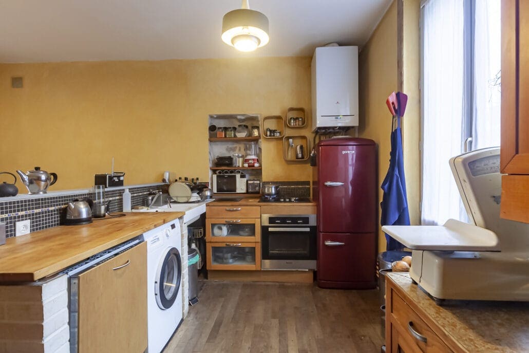 Cuisine salle &agrave; manger - Photo immobili&egrave;re